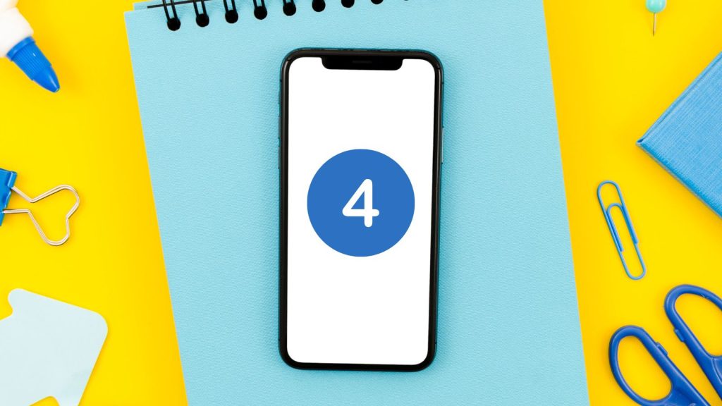 The number 4 on a phone and notebook